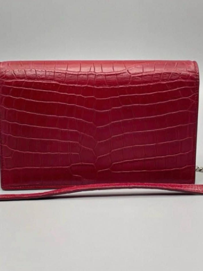 Saint Laurent Kate in burgundy crocodile-embossed leather with a silver tassel